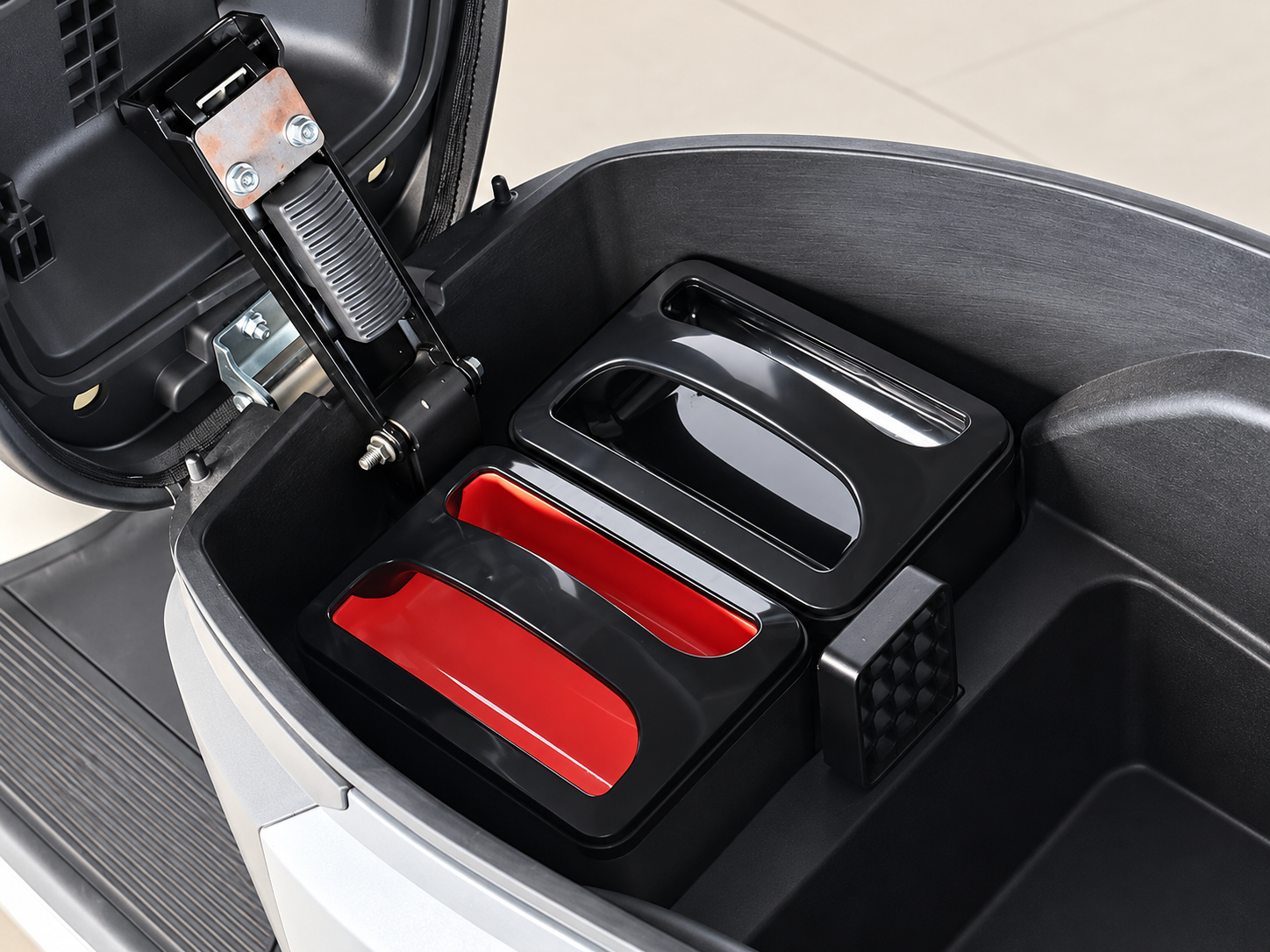 Two battery packs installed under the seat